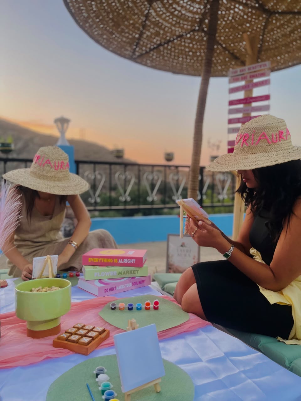 Atelier peinture au coucher du soleil sous le parasol
